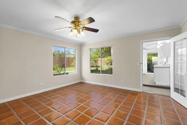 a kitchen with kitchen island a counter top space appliances and cabinets