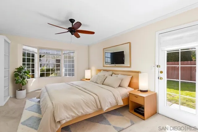 a bathroom with double vanity sinks a vanity a lamp and a mirror