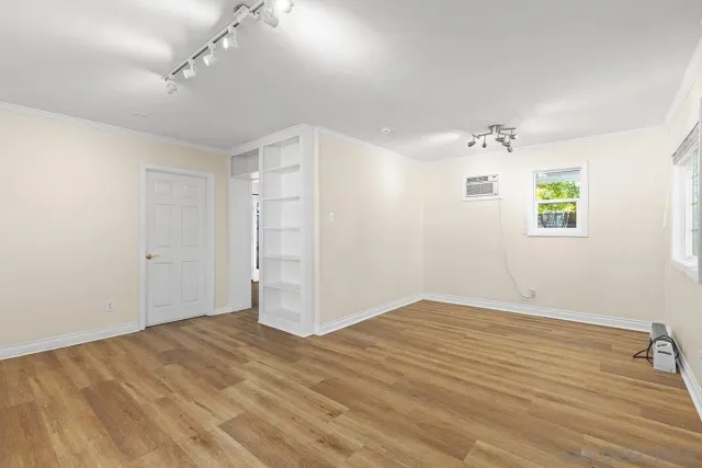 a view of a backyard with chairs