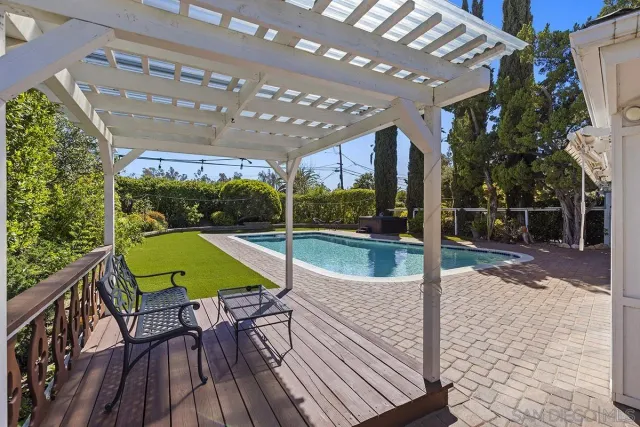 an aerial view of residential house with outdoor space and street view