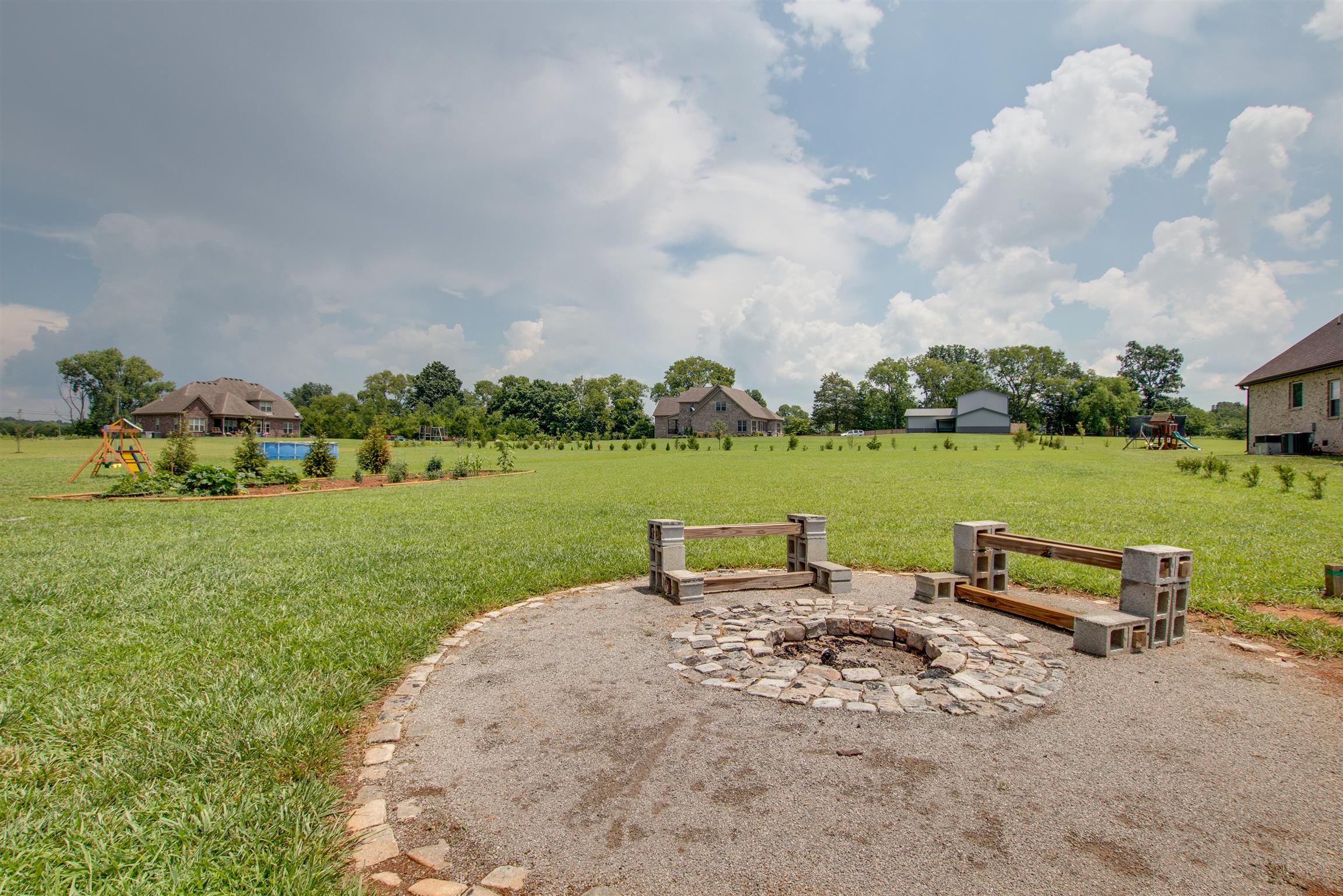 9610 Mona Road Murfreesboro, TN 37129 - Photo 28 of 30 Fire-pit area with breathtaking views of your large backyard