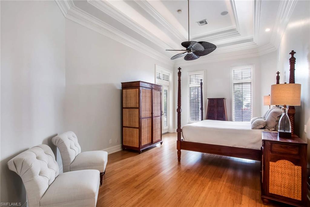 516 Portside Drive Naples, FL 34103 - Photo 17 of 25 a living room with furniture and a wooden floor