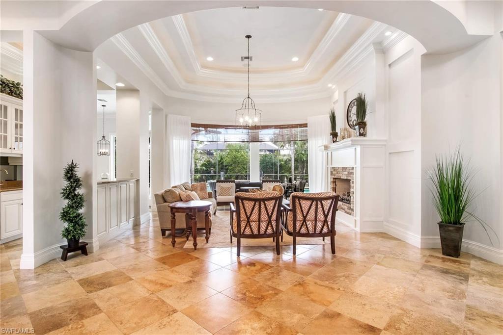 516 Portside Drive Naples, FL 34103 - Photo 3 of 25 a view of a livingroom with furniture and window
