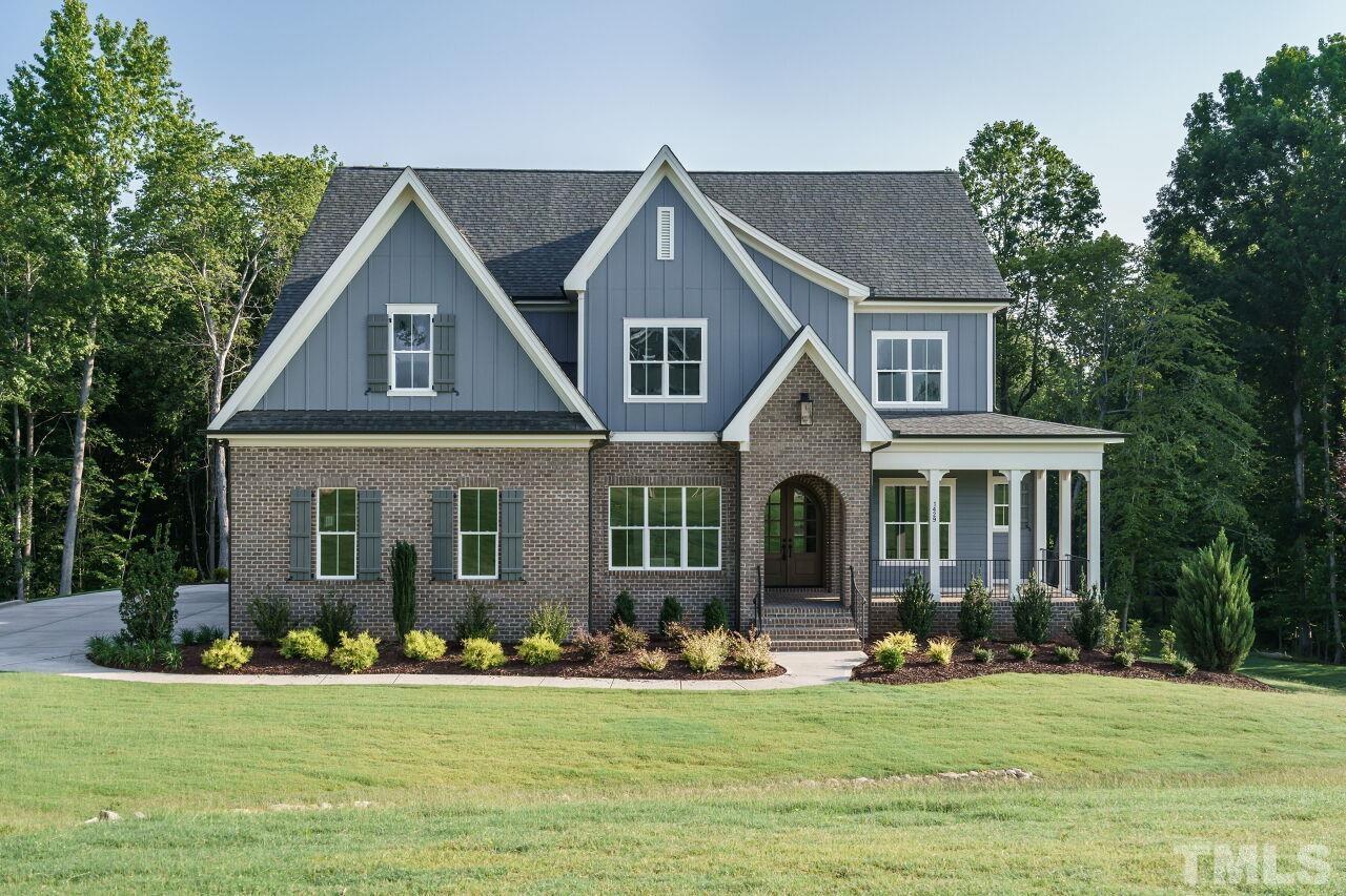 1429 Blantons Creek Drive Wake Forest, NC 27587 - Photo 21 of 40 a front view of a house with a yard