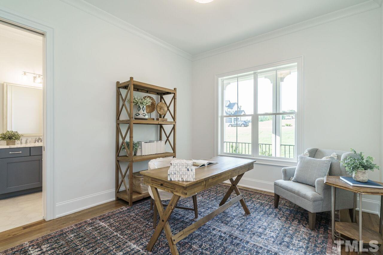 1429 Blantons Creek Drive Wake Forest, NC 27587 - Photo 26 of 40 a living room with furniture and window