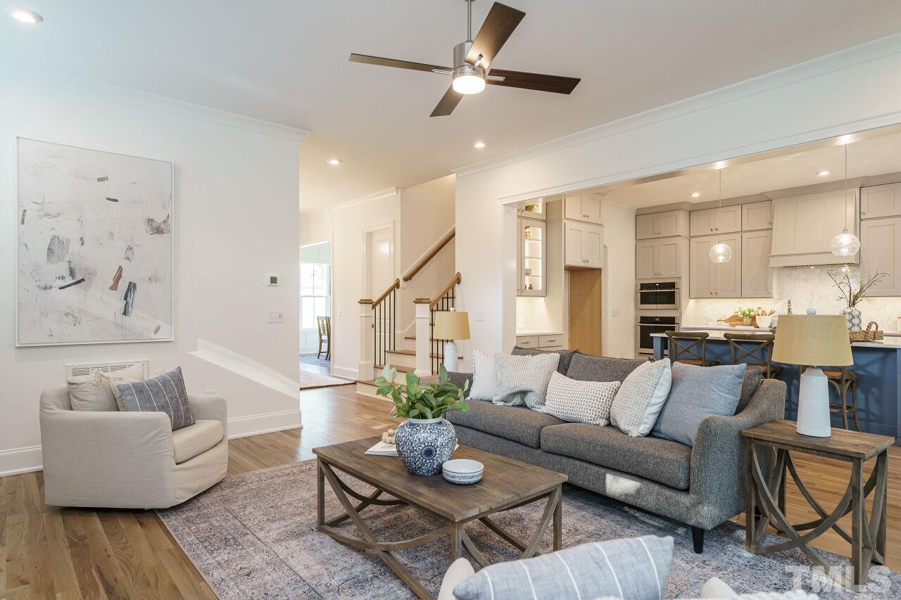 1429 Blantons Creek Drive Wake Forest, NC 27587 - Photo 40 of 40 a living room with furniture and wooden floor