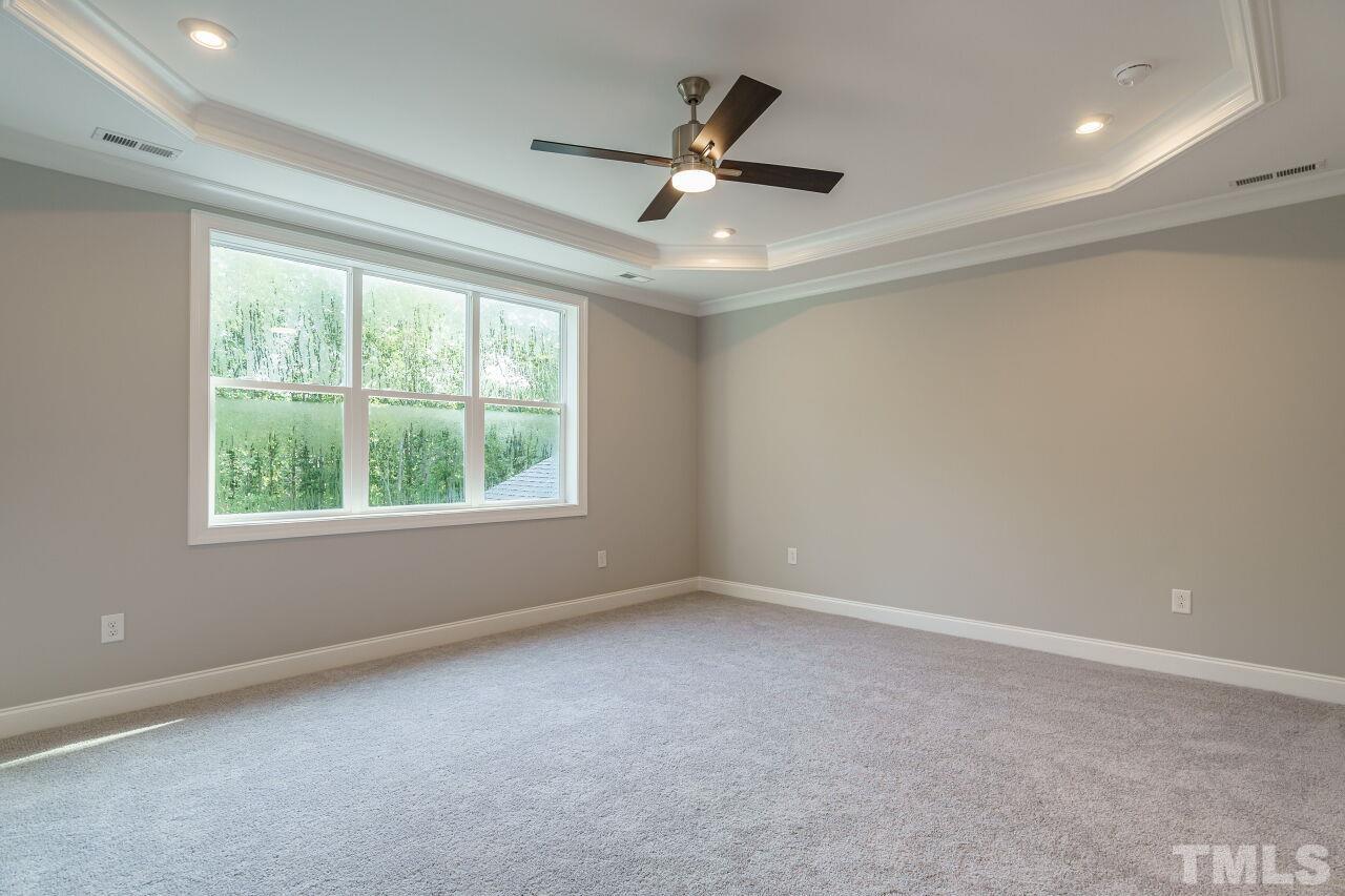 1429 Blantons Creek Drive Wake Forest, NC 27587 - Photo 6 of 40 a view of an empty room with a window