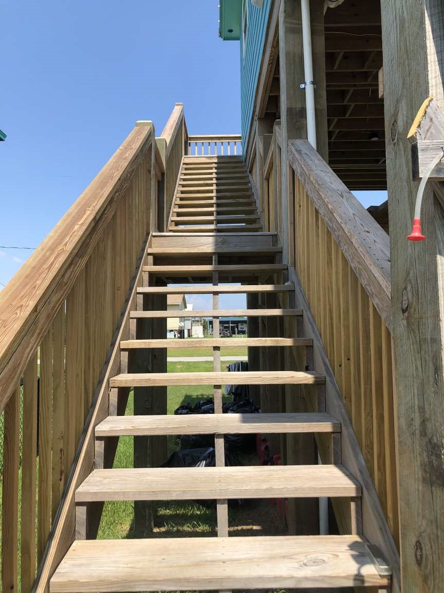 1021 North Sage Road Crystal Beach, TX 77650 - Photo 7 of 7 a view of entryway and hall with wooden floor