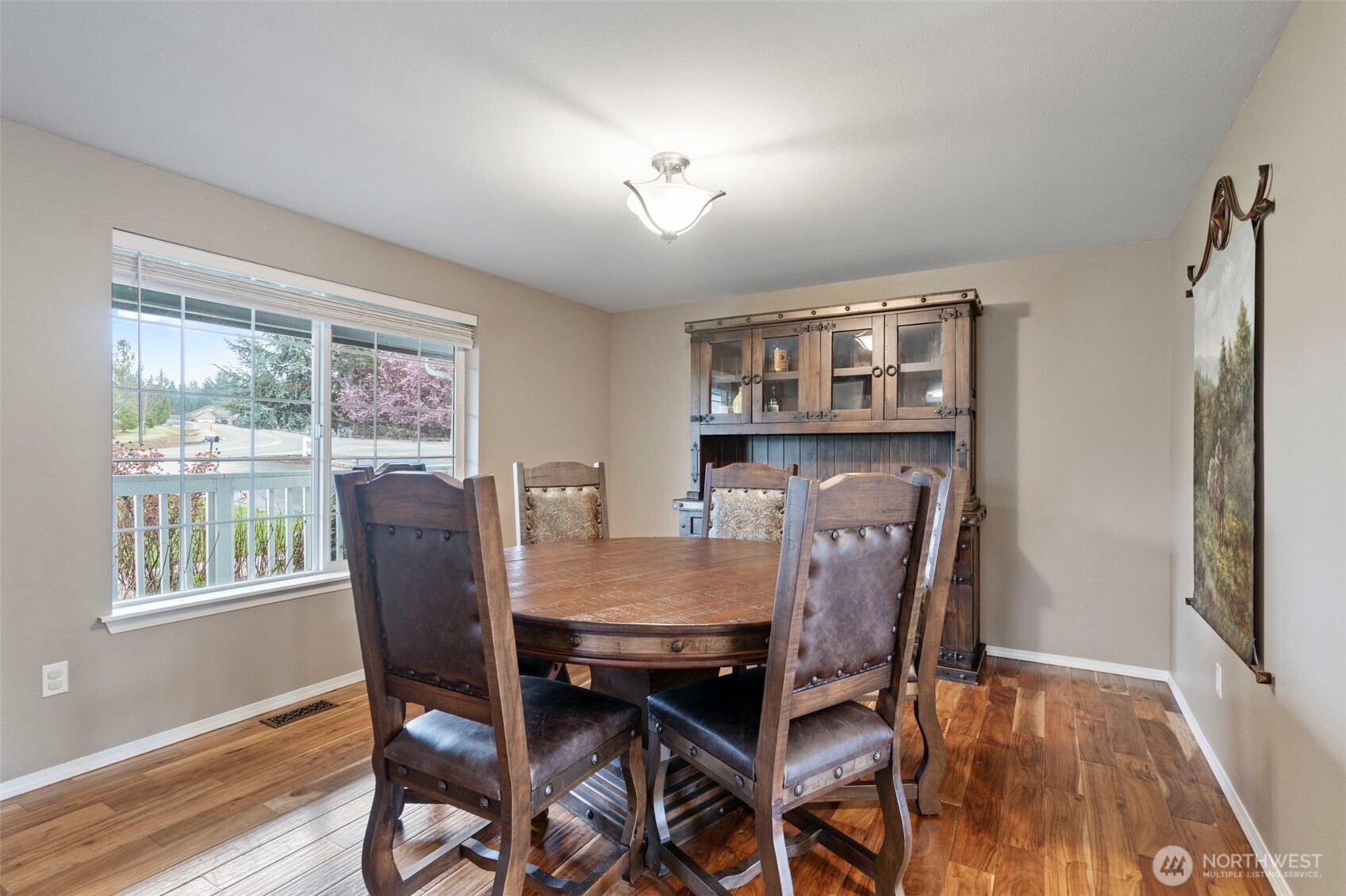 140 Garrett Loop Chehalis, WA 98532 - Photo 15 of 38 a view of a dining room with furniture window and wooden floor