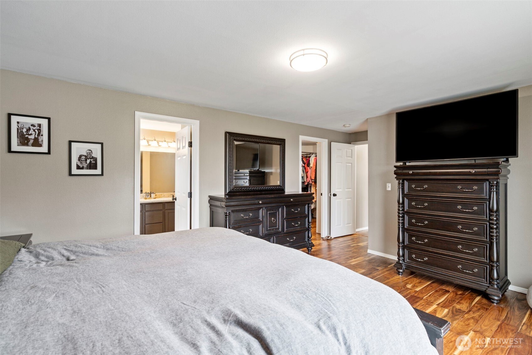 140 Garrett Loop Chehalis, WA 98532 - Photo 20 of 38 a bedroom with a bed and a flat screen tv