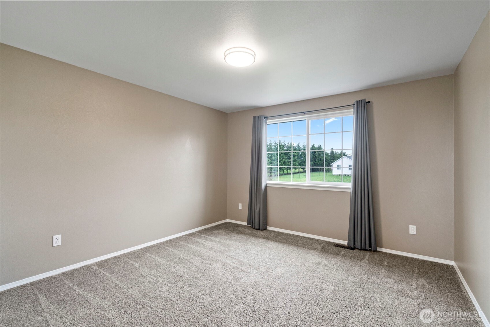 140 Garrett Loop Chehalis, WA 98532 - Photo 27 of 38 a view of an empty room with a window