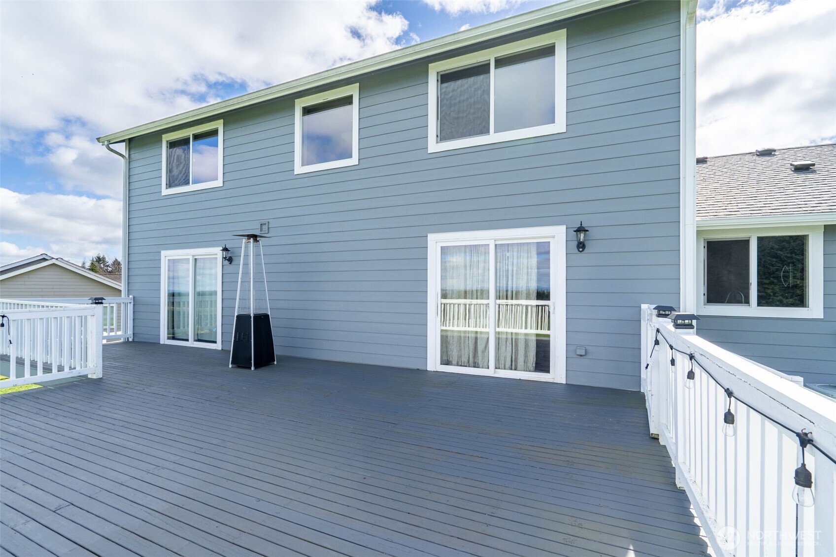 140 Garrett Loop Chehalis, WA 98532 - Photo 32 of 38 a view of a house with deck and a yard