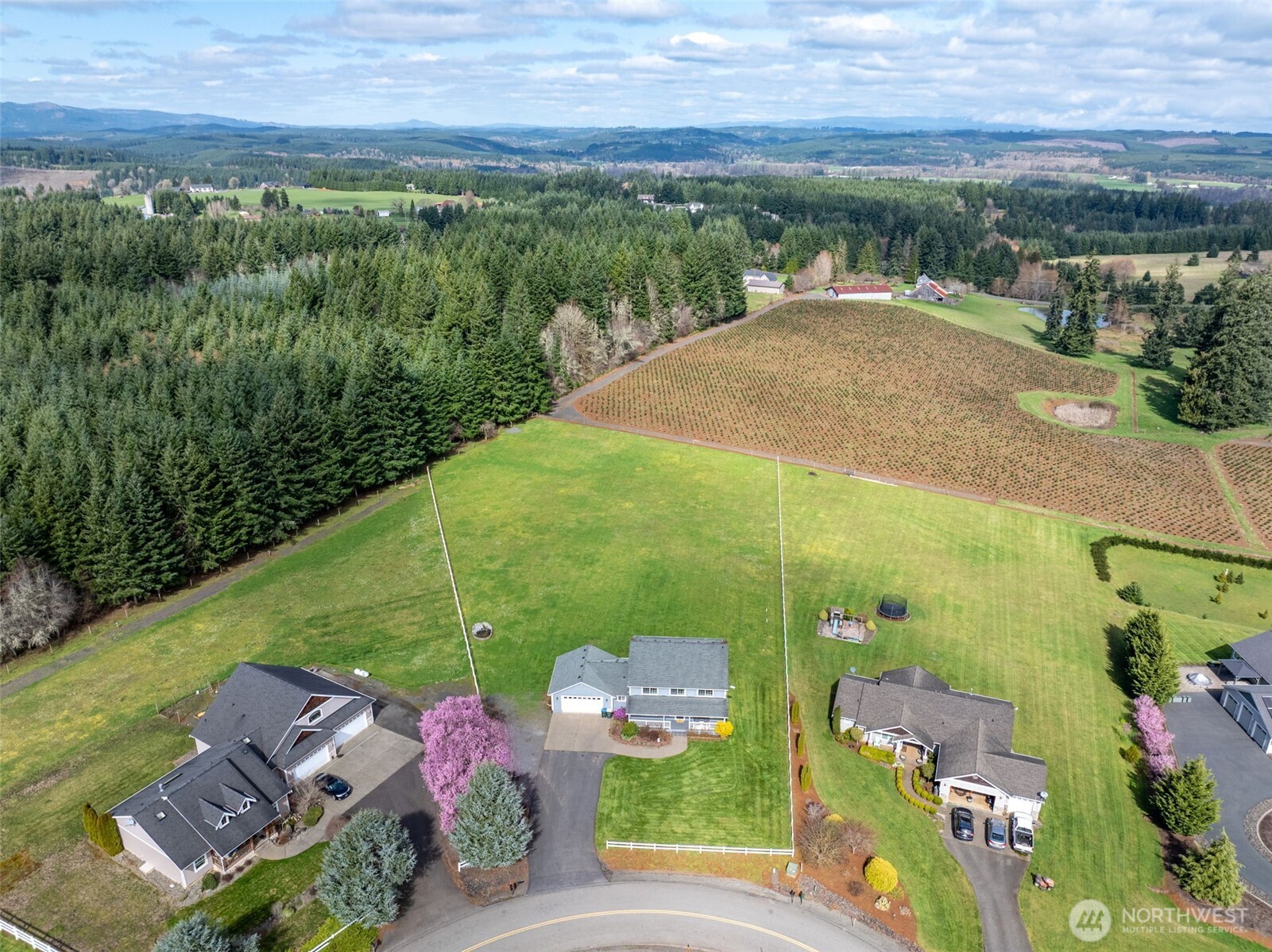 140 Garrett Loop Chehalis, WA 98532 - Photo 8 of 38 an aerial view of a house with a garden