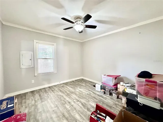 a bedroom with furniture and a window