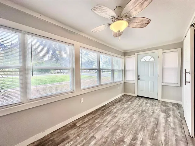 a view of an empty room and window
