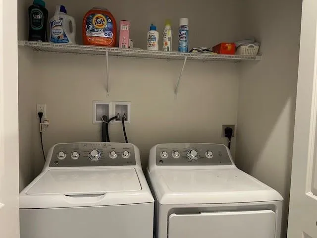 a utility room with dryer and washer