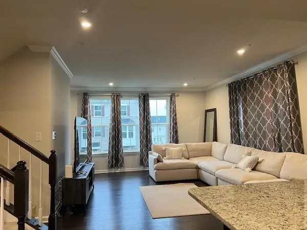 a living room with furniture and a couch