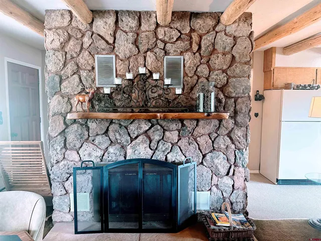 a view of a wooden door and chair