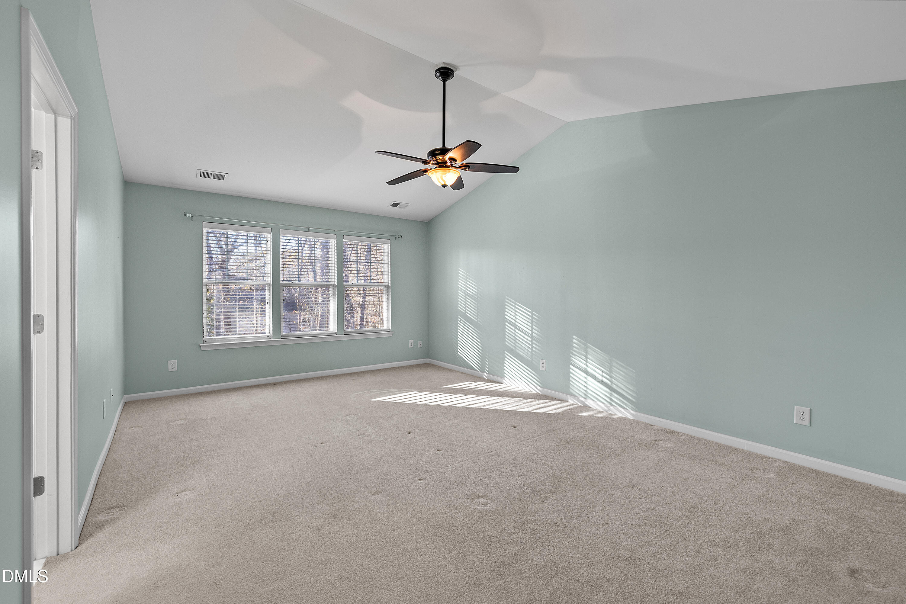 7837 Cape Charles Drive Raleigh, NC 27617 - Photo 16 of 44 a view of an empty room with a window