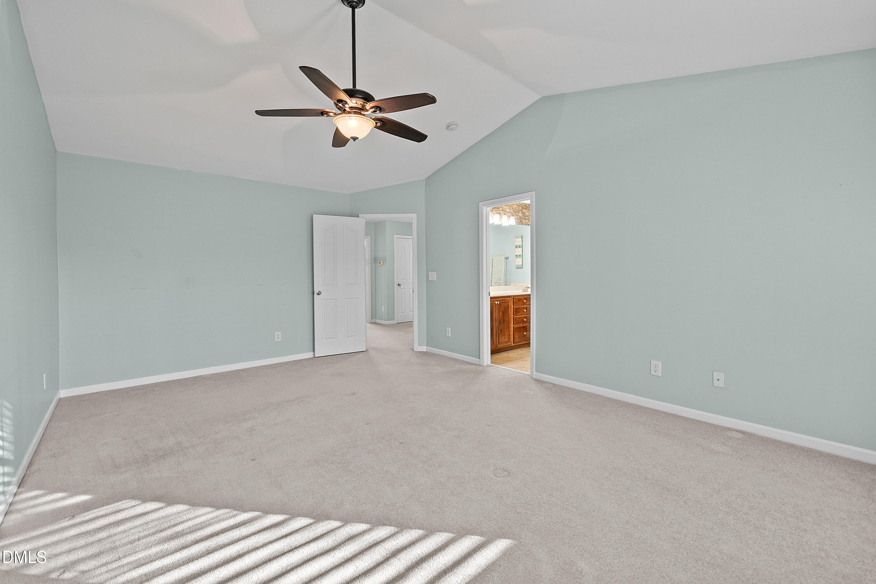 7837 Cape Charles Drive Raleigh, NC 27617 - Photo 17 of 44 a view of a livingroom with a ceiling fan and window