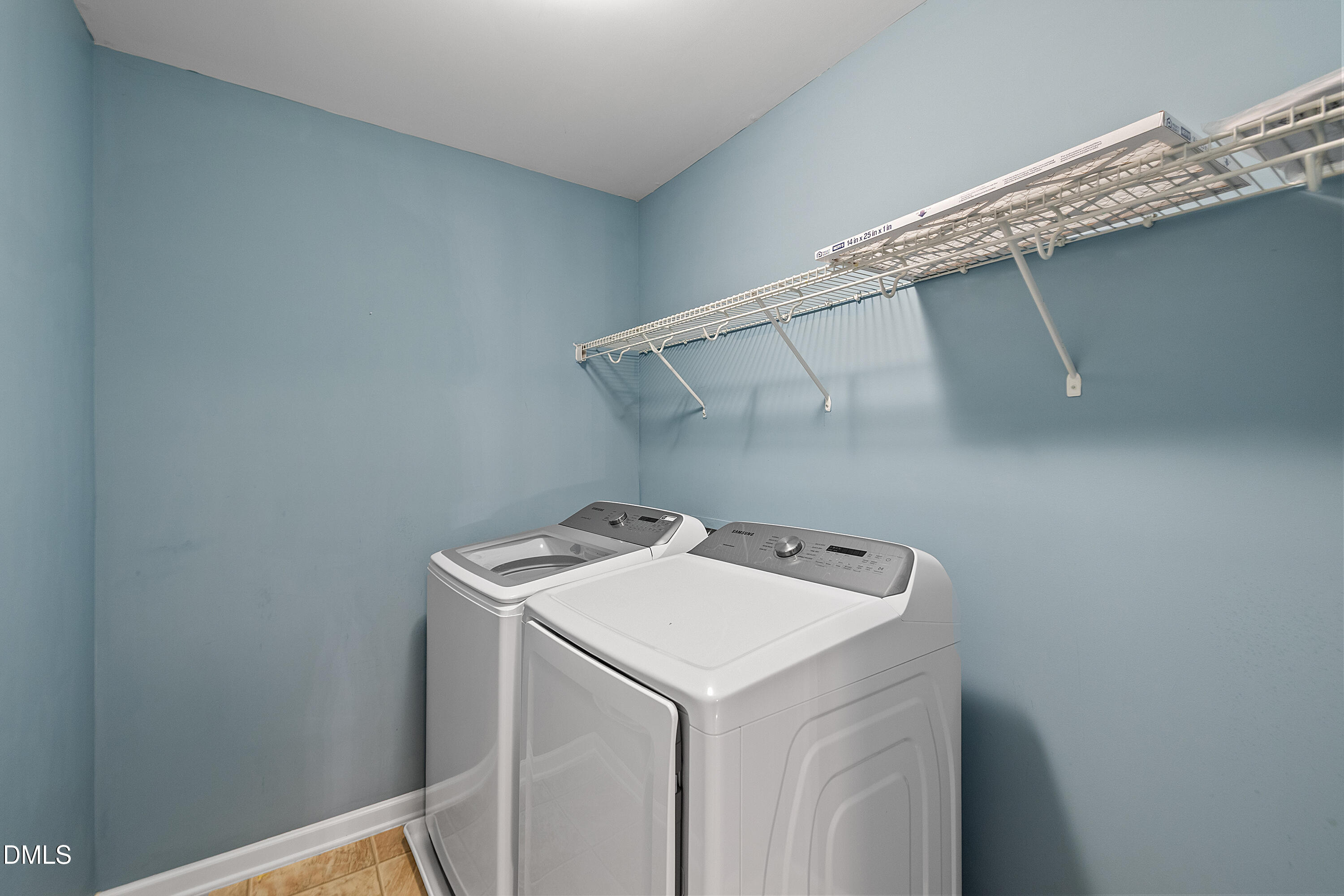 7837 Cape Charles Drive Raleigh, NC 27617 - Photo 29 of 43 a utility room with dryer and washer