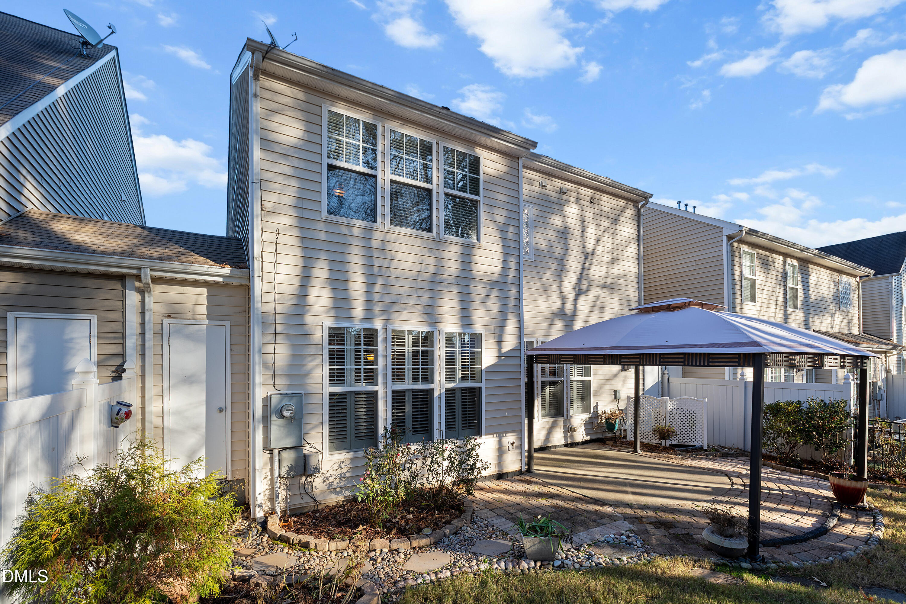7837 Cape Charles Drive Raleigh, NC 27617 - Photo 35 of 43 a front view of a house with a yard