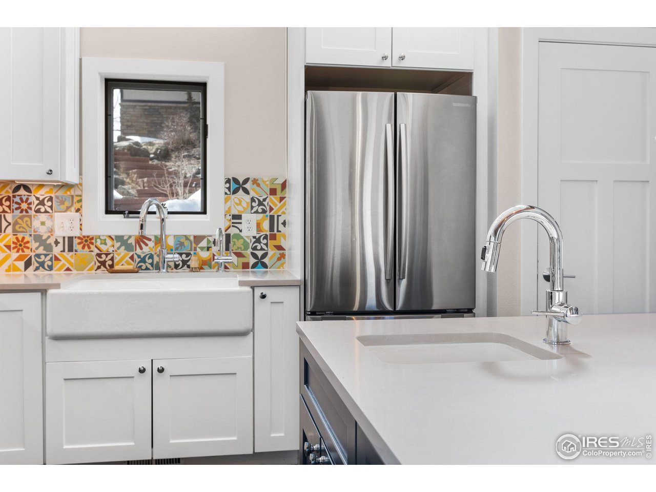 1346 Deer Trail Road Boulder, CO 80302 - Photo 10 of 40 a bathroom with a sink and a mirror