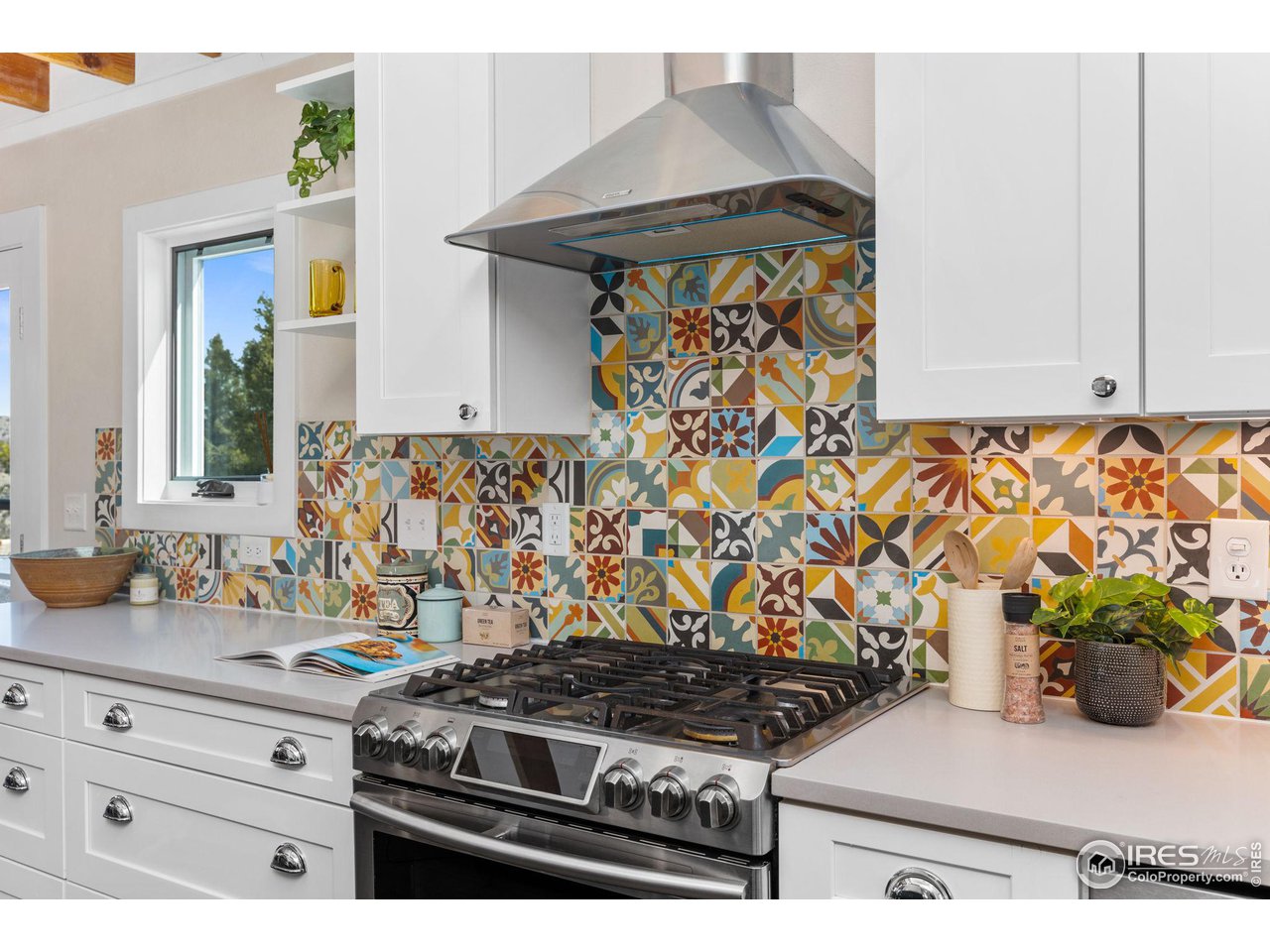 1346 Deer Trail Road Boulder, CO 80302 - Photo 11 of 40 a kitchen with a stove and cabinets
