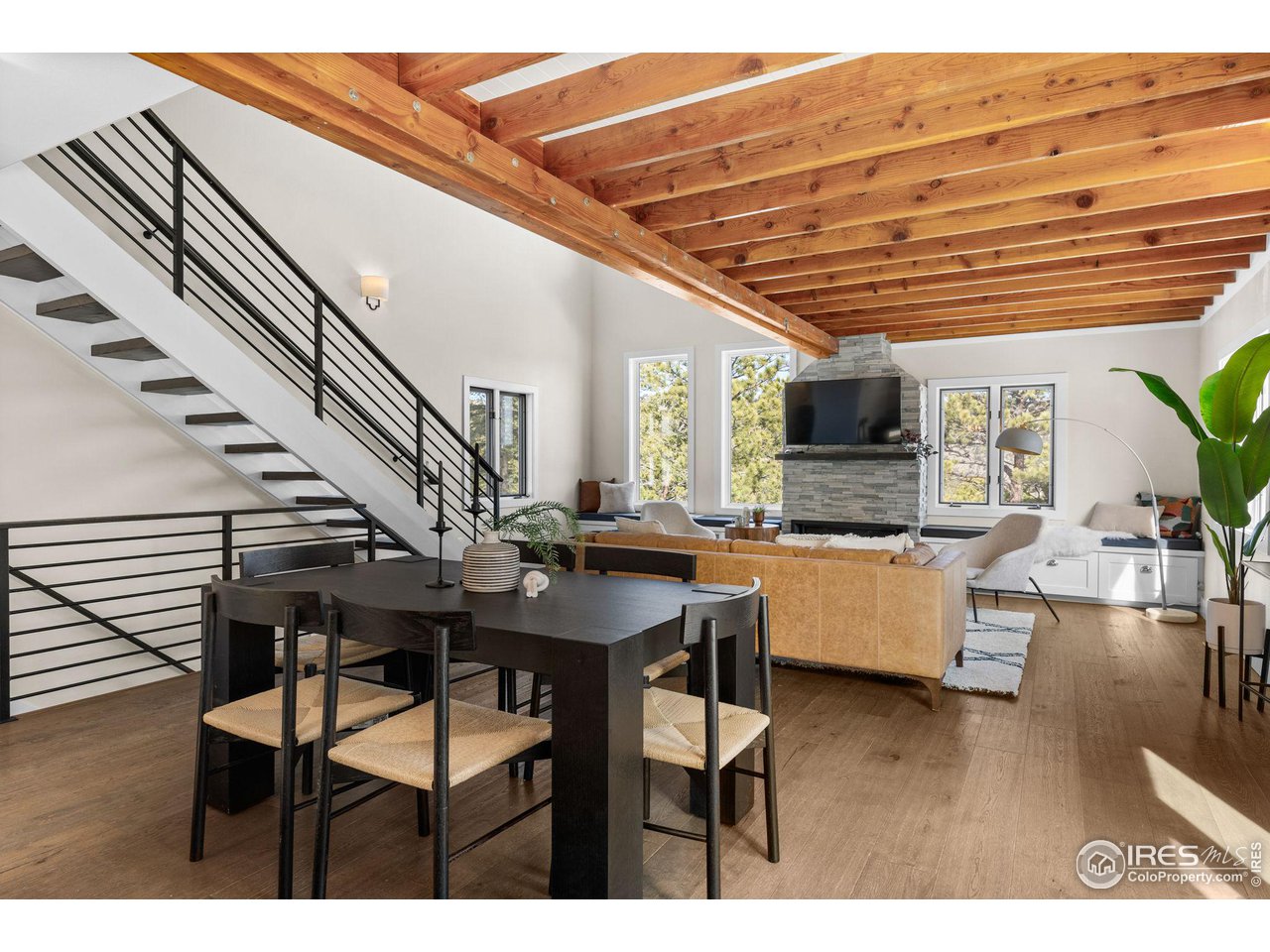1346 Deer Trail Road Boulder, CO 80302 - Photo 15 of 40 a dining room with furniture and wooden floor
