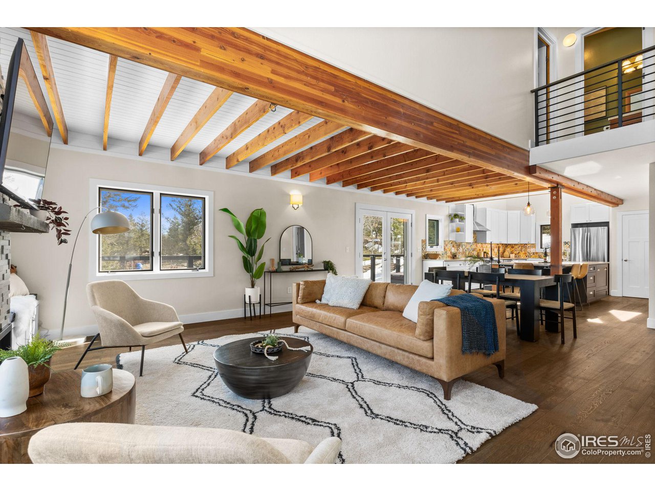 1346 Deer Trail Road Boulder, CO 80302 - Photo 16 of 40 a living room with furniture and a large window