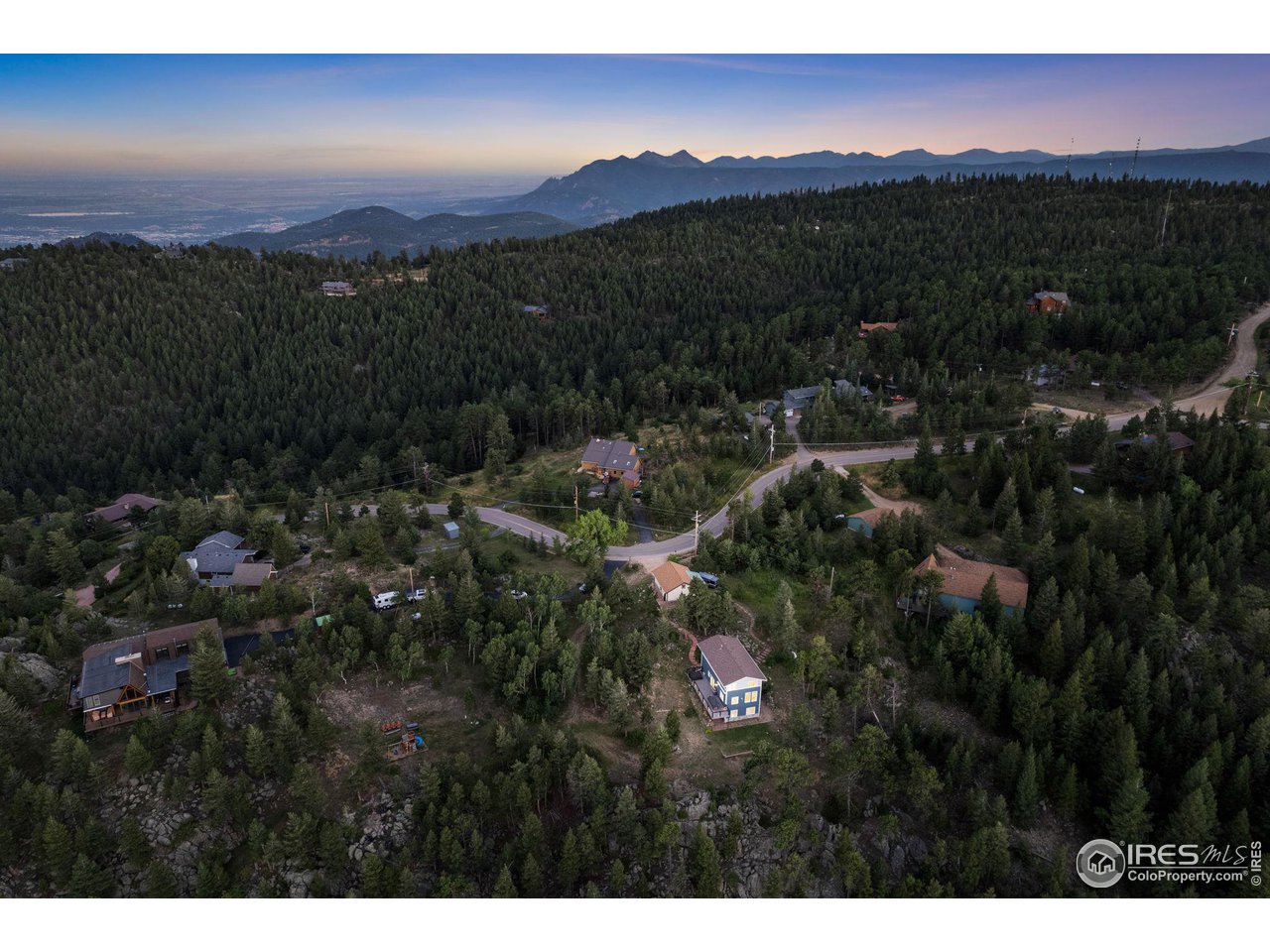 1346 Deer Trail Road Boulder, CO 80302 - Photo 2 of 40 a view of sunset and green space