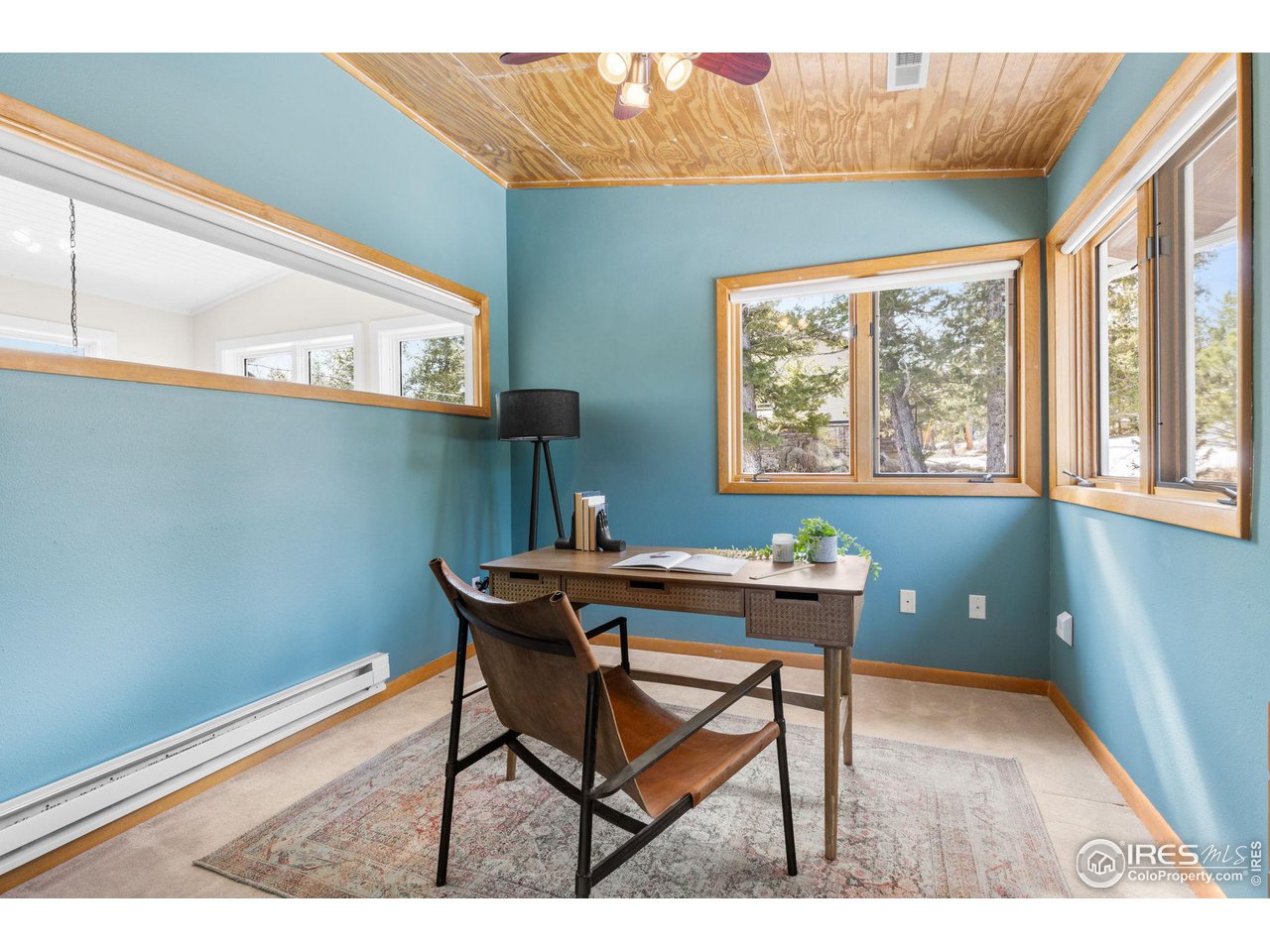 1346 Deer Trail Road Boulder, CO 80302 - Photo 25 of 40 a workspace with furniture and window