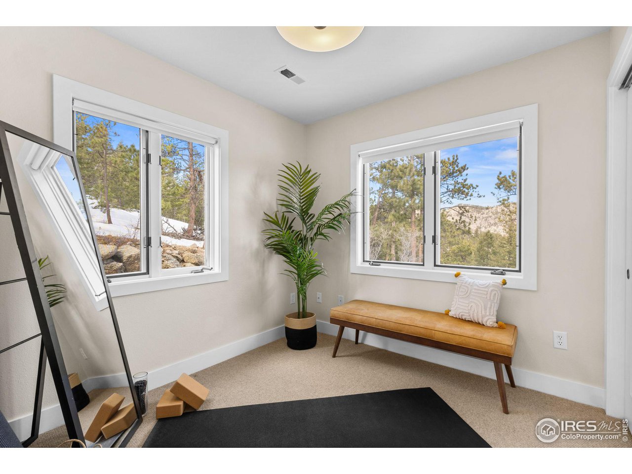 1346 Deer Trail Road Boulder, CO 80302 - Photo 29 of 40 a living room with furniture and a window