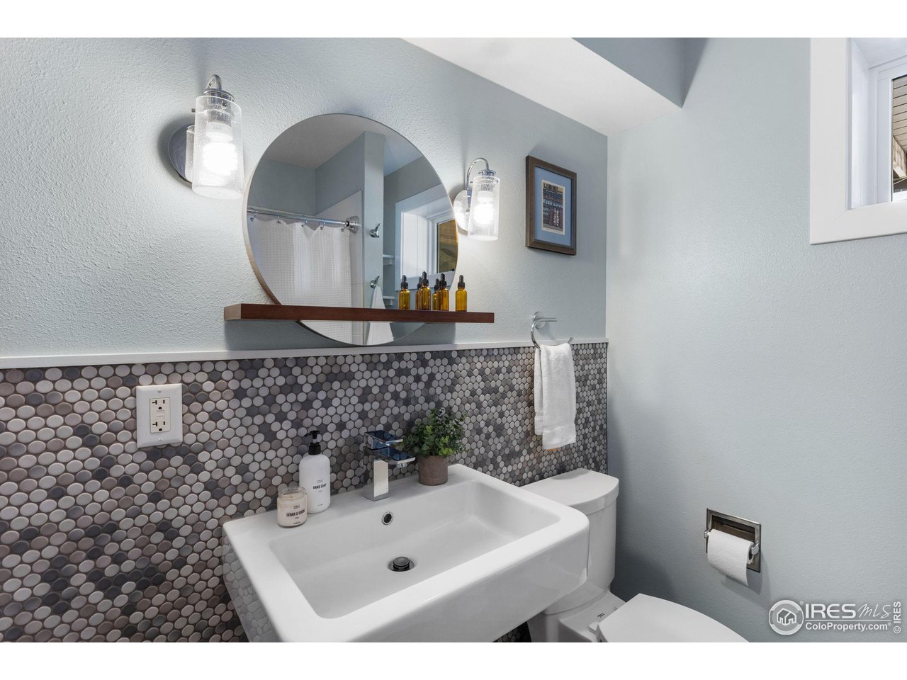 1346 Deer Trail Road Boulder, CO 80302 - Photo 30 of 40 a bathroom with a sink and mirror