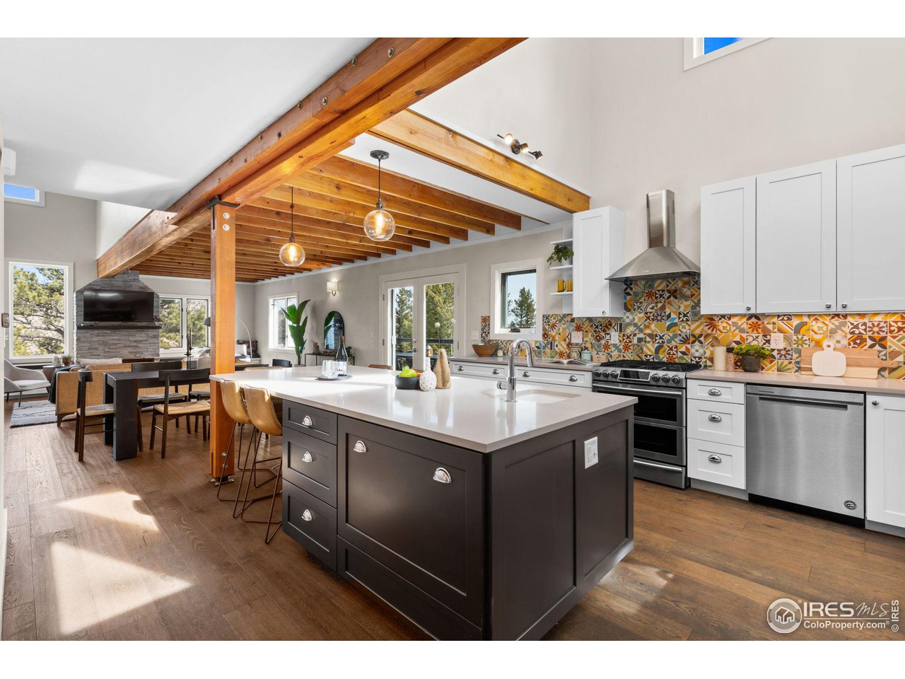 1346 Deer Trail Road Boulder, CO 80302 - Photo 39 of 40 a kitchen with lots of counter top space and appliances