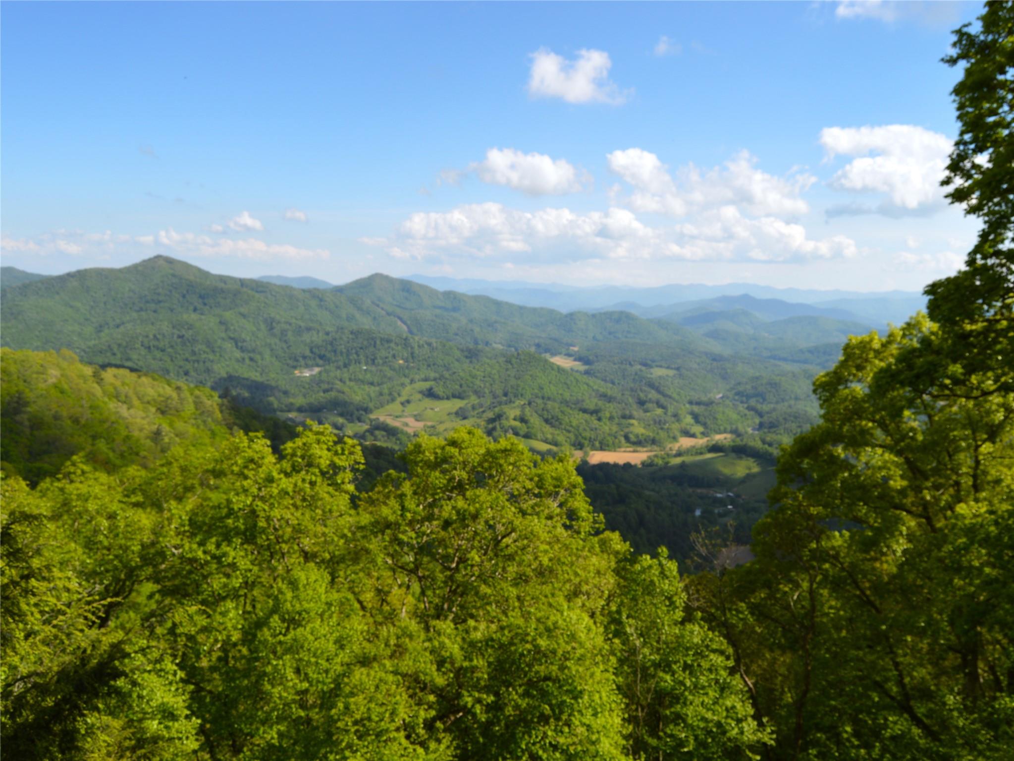 120 Skyridge Drive Clyde, NC 28721 - Photo 29 of 33 a view of a city and mountains