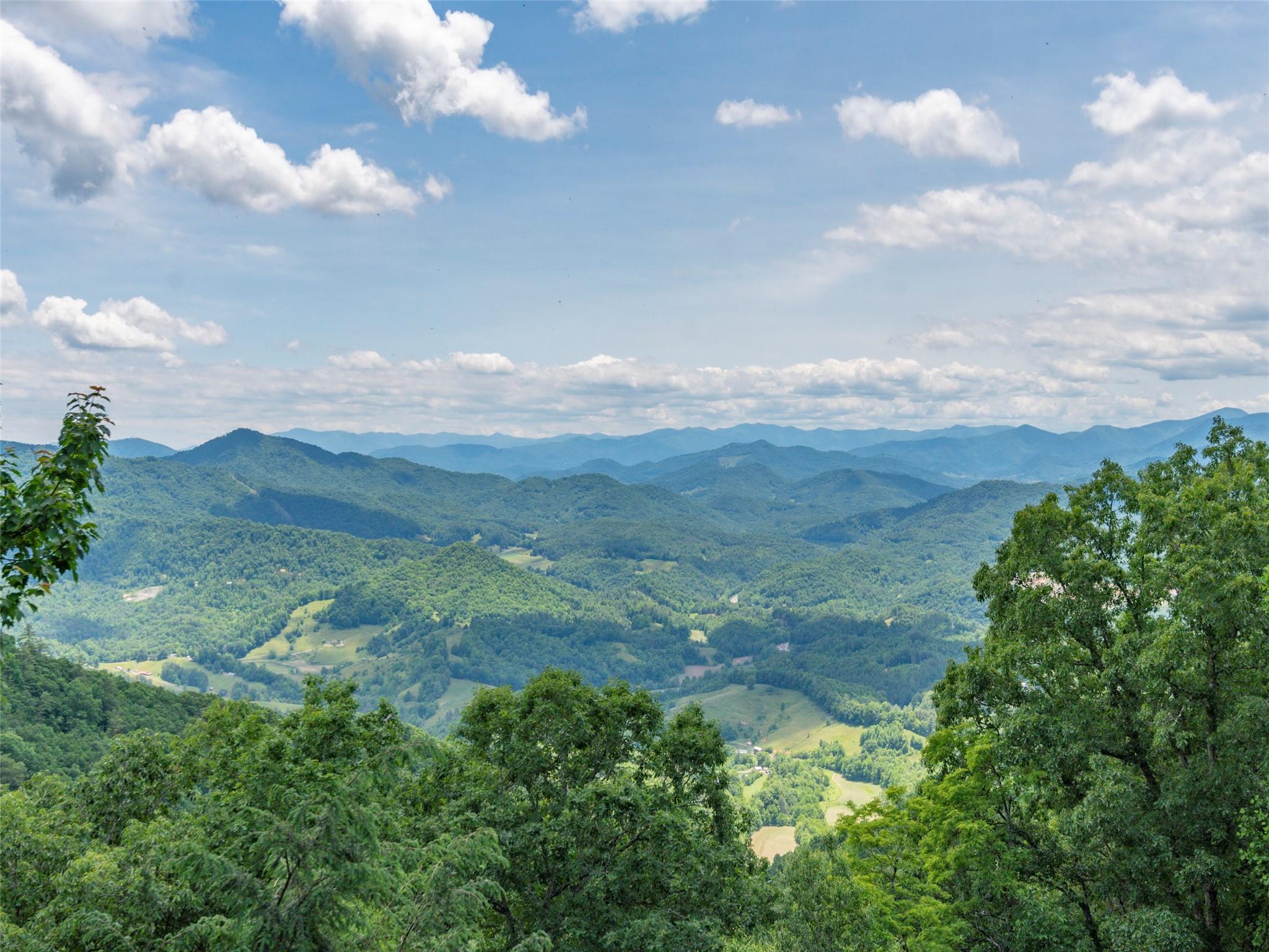 120 Skyridge Drive Clyde, NC 28721 - Photo 3 of 33 a view of outdoor space and mountain view