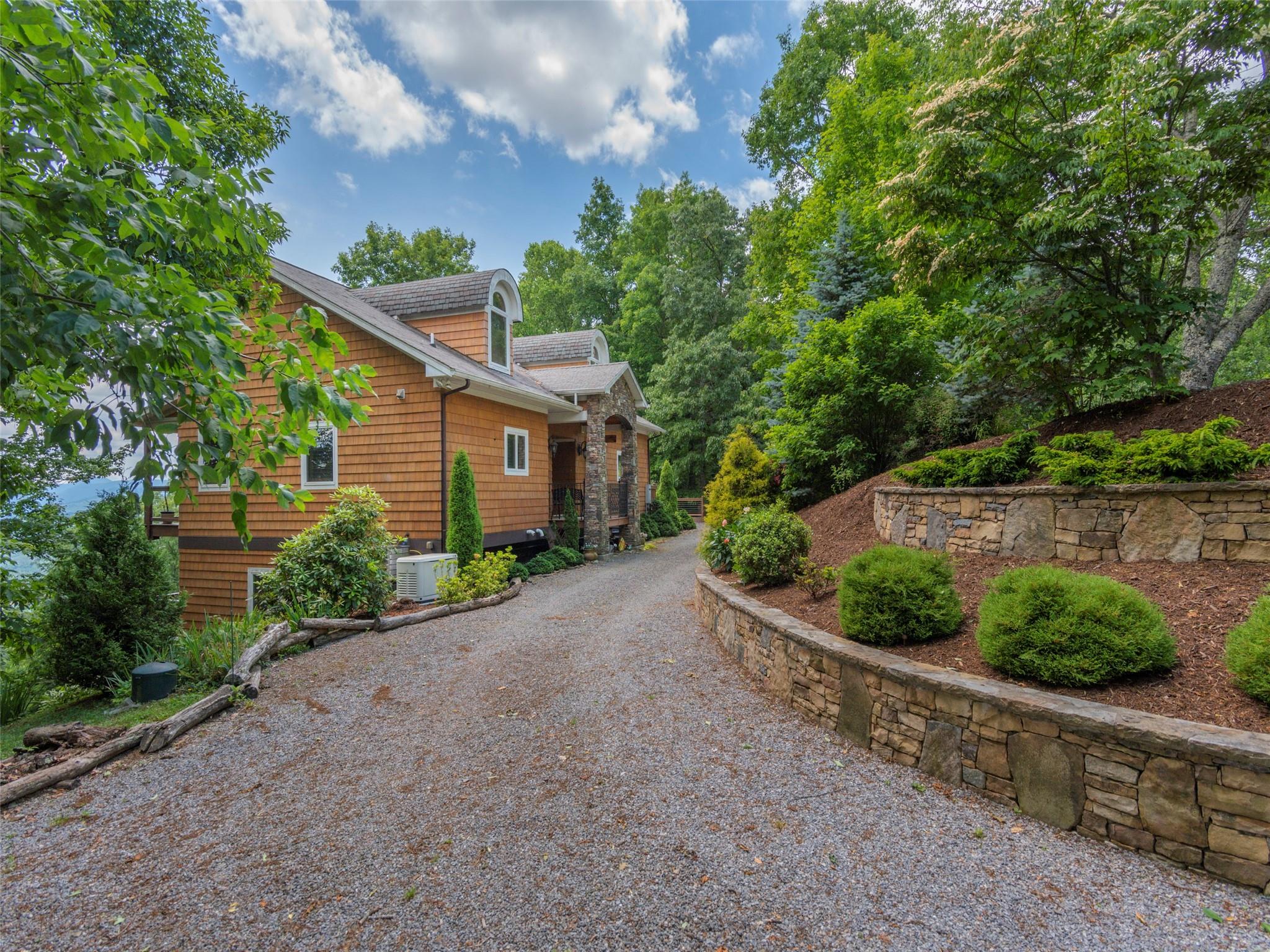 120 Skyridge Drive Clyde, NC 28721 - Photo 32 of 33 a view of a back yard with plants