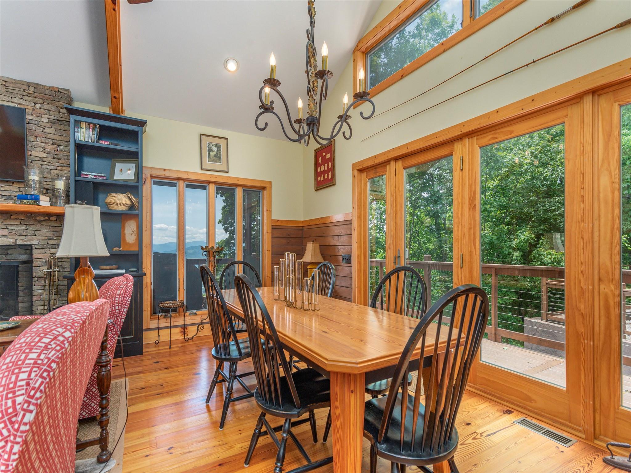 120 Skyridge Drive Clyde, NC 28721 - Photo 9 of 33 a view of a dining room with furniture window and outside view