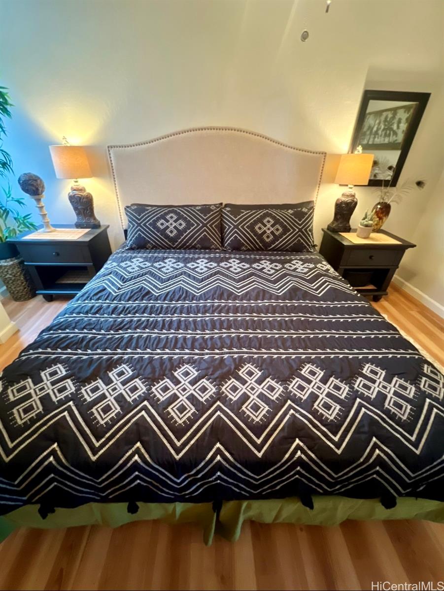 84-664 Ala Mahiku Street, Unit 194C Waianae, HI 96792 - Photo 16 of 25 a bedroom with a bed