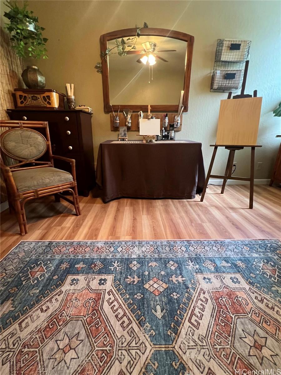 84-664 Ala Mahiku Street, Unit 194C Waianae, HI 96792 - Photo 17 of 25 a living room with furniture and a flat screen tv