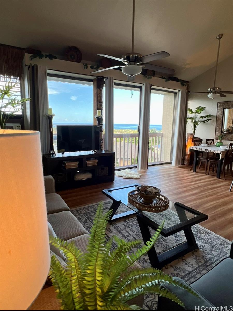 84-664 Ala Mahiku Street, Unit 194C Waianae, HI 96792 - Photo 19 of 25 a living room with furniture and a flat screen tv