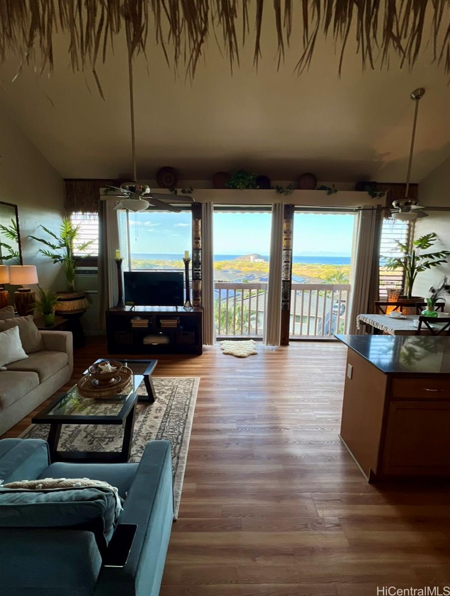84-664 Ala Mahiku Street, Unit 194C Waianae, HI 96792 - Photo 2 of 25 a living room with furniture and a flat screen tv