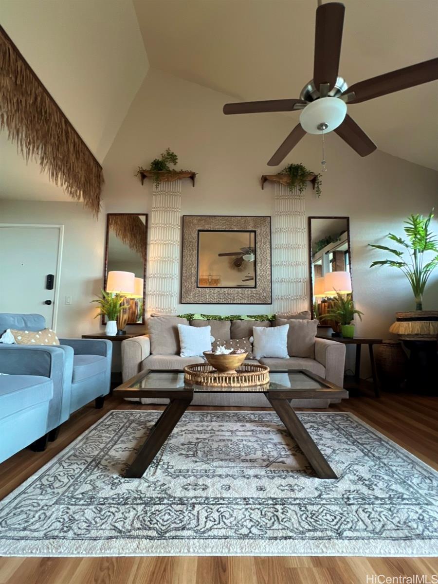 84-664 Ala Mahiku Street, Unit 194C Waianae, HI 96792 - Photo 3 of 25 a living room with furniture and a rug