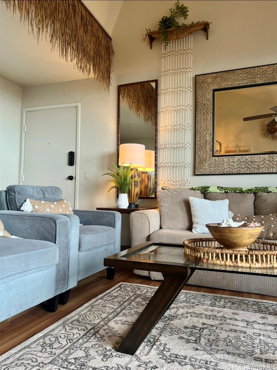 84-664 Ala Mahiku Street, Unit 194C Waianae, HI 96792 - Photo 4 of 25 a living room with furniture and a rug