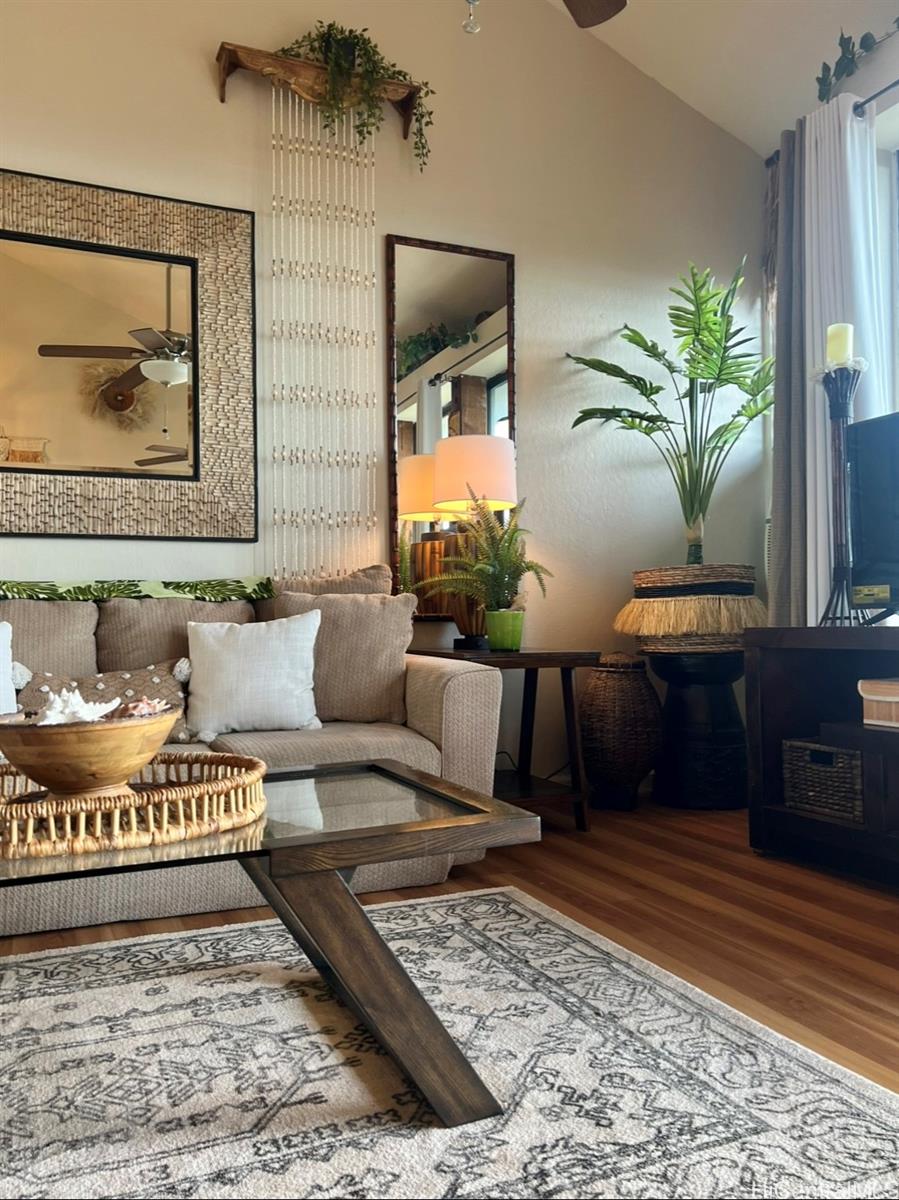 84-664 Ala Mahiku Street, Unit 194C Waianae, HI 96792 - Photo 5 of 25 a living room with furniture and a rug