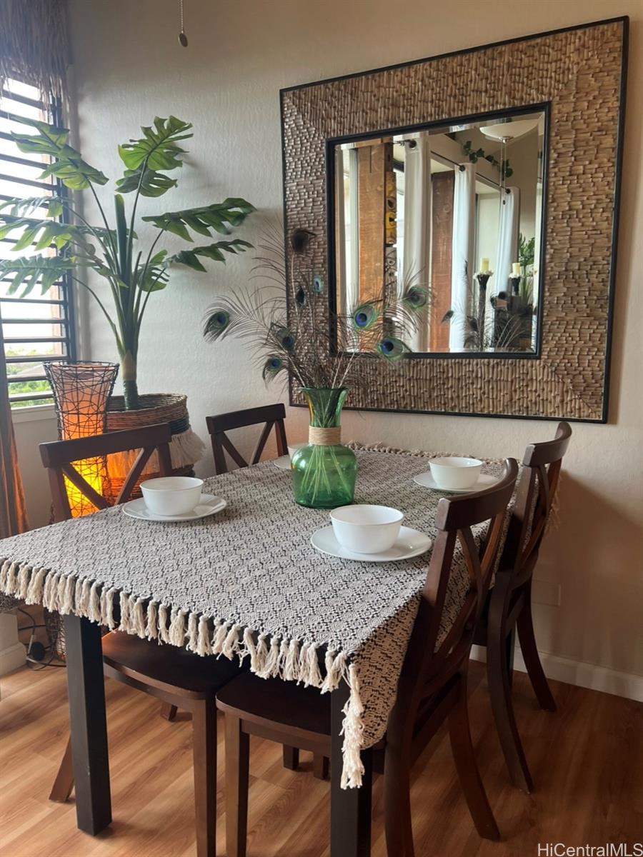 84-664 Ala Mahiku Street, Unit 194C Waianae, HI 96792 - Photo 7 of 25 a view of a dining room with furniture and window