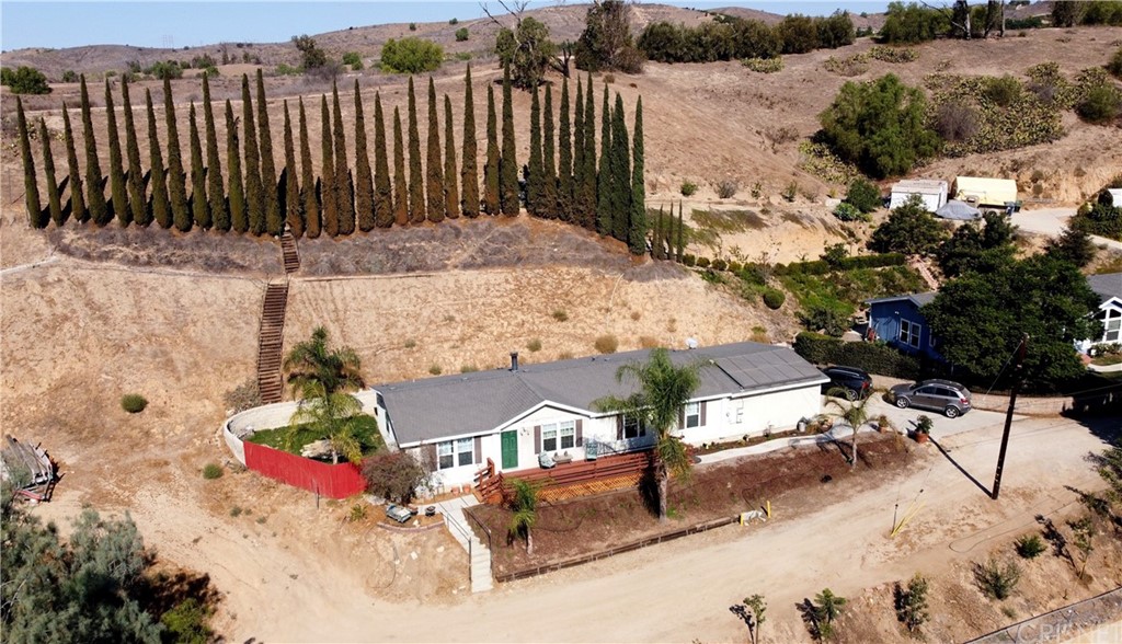 1079 Walnut Canyon Road Moorpark, CA 93021 - Photo 1 of 1 an aerial view of a house with a yard