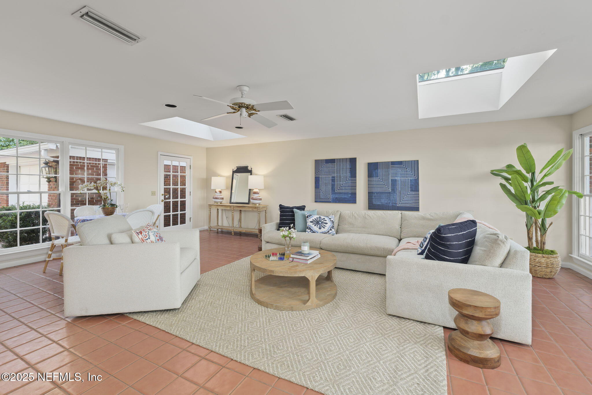 12550 Mandarin Road Jacksonville, FL 32223 - Photo 29 of 49 a living room with furniture and a large window