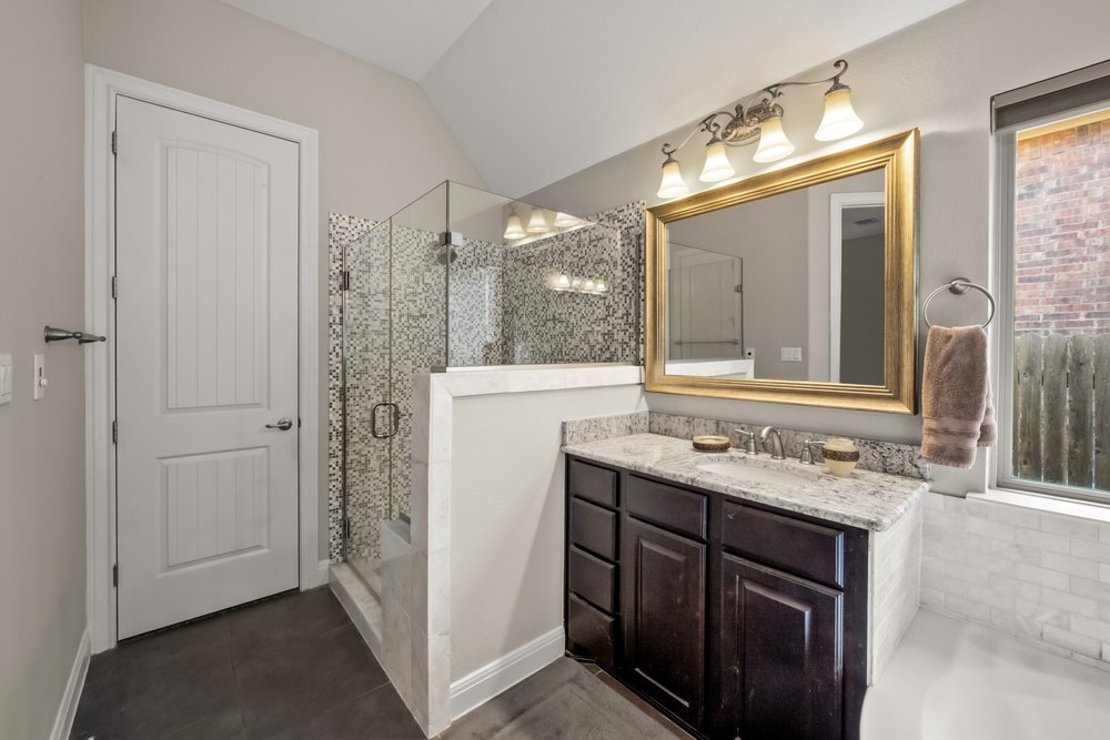 1589 Cool Spring Way Austin, TX 78737 - Photo 16 of 32 Primary bath with separate shower and walk-in closet.